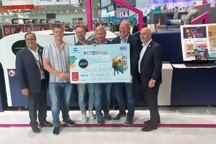 <p>RKGrafisk og Roger Wiig, Konica Minolta, tillsammans med MGI.</p>
